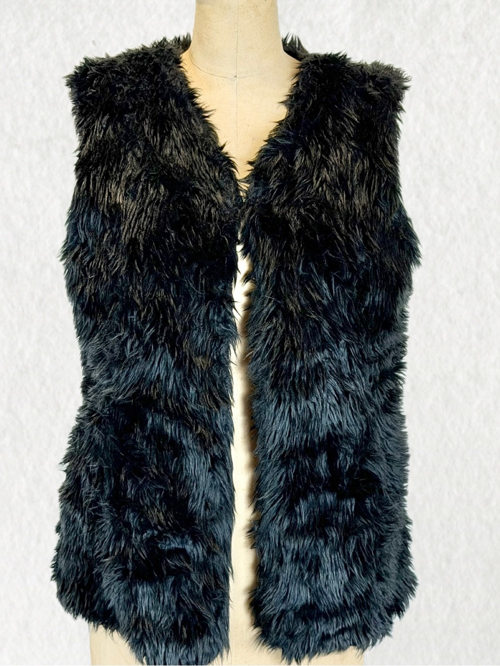 Faux fur shaggy vest jacket teddy pile texture fashionista glam open front layer